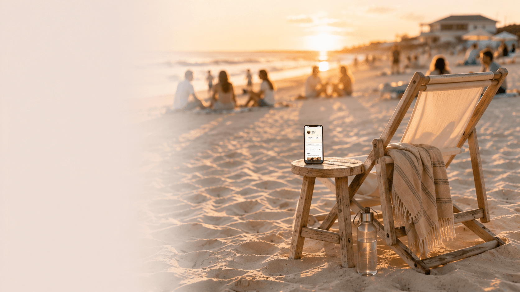 A peaceful beach at golden hour with the Nova sobriety community displayed on a phone and people gathering softly in the background.